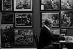 Senior man doing puzzle at table