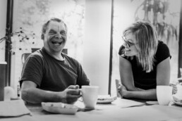 Senior man laughing with female