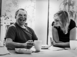 Senior man laughing with female