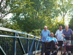 Senior Living, Senior Men, Senior Men walking across bridge, Aging gracefully