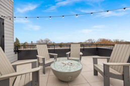 rooftop terrace with patio lights, grill and gas firepit